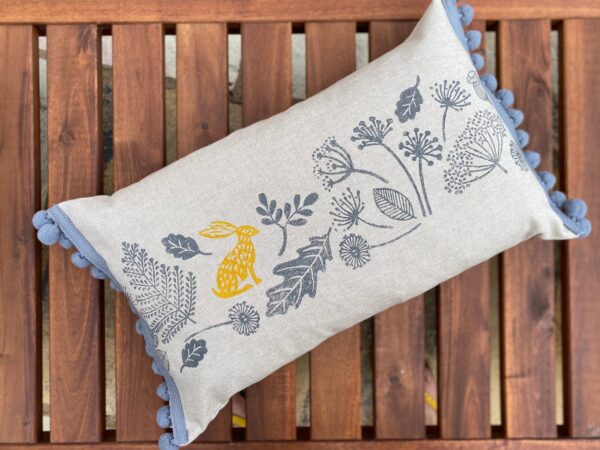 Fox and Hare Pom Pom Bolster Cushion - Image 2